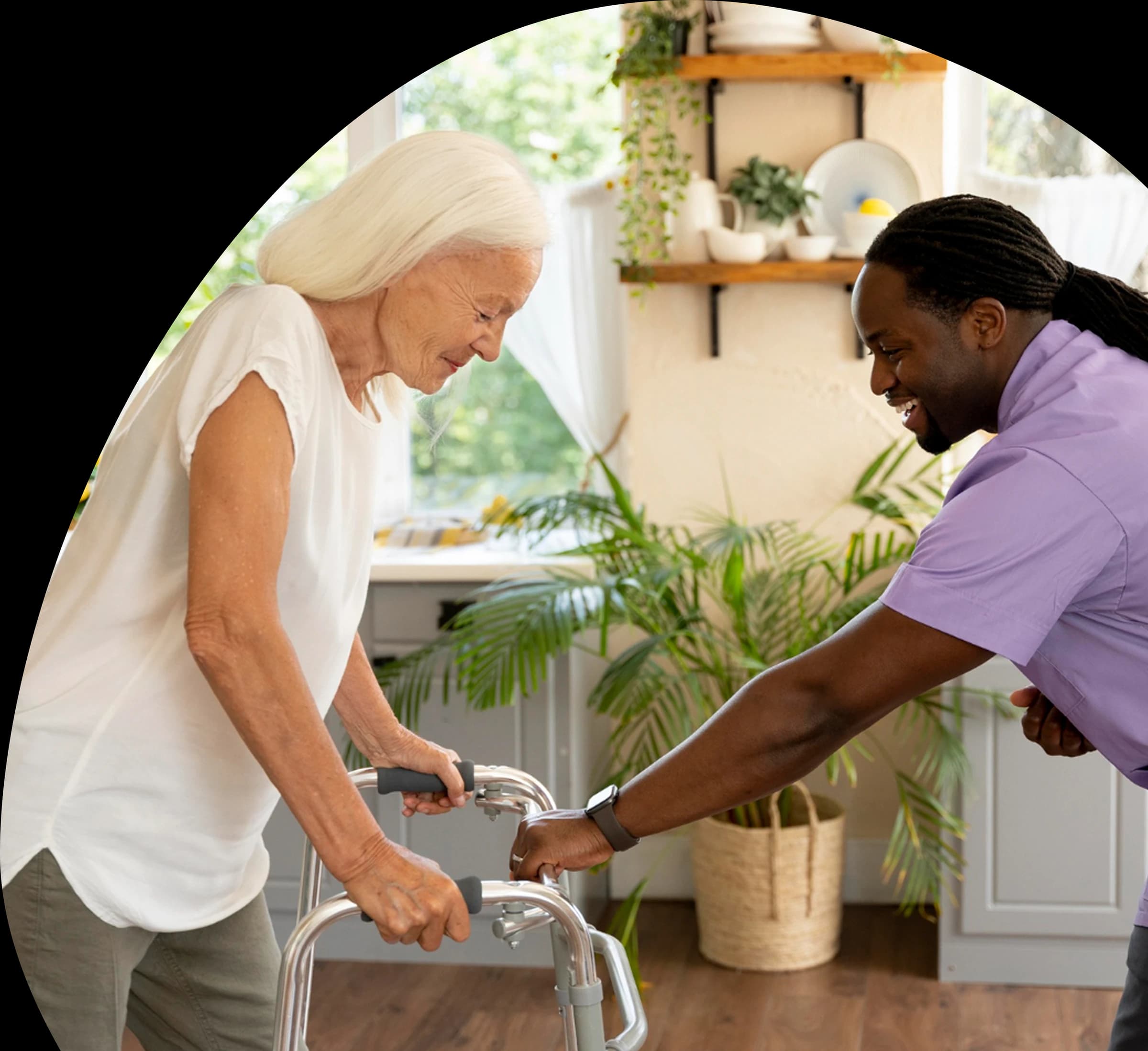 A 123 GA caregiver helping a client use a walker at home